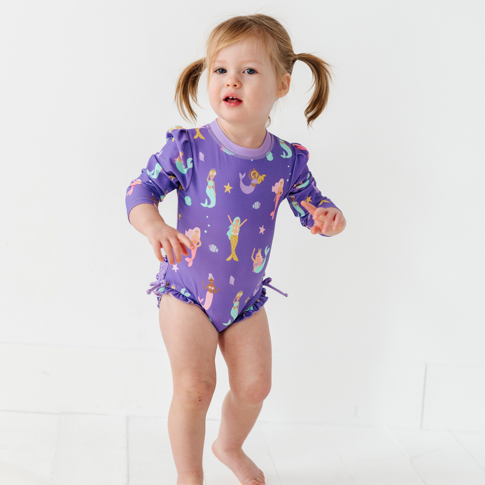 
                      
                        Mermaid in the U.S.A. Long Sleeve Ruffle Swimsuit
                      
                    