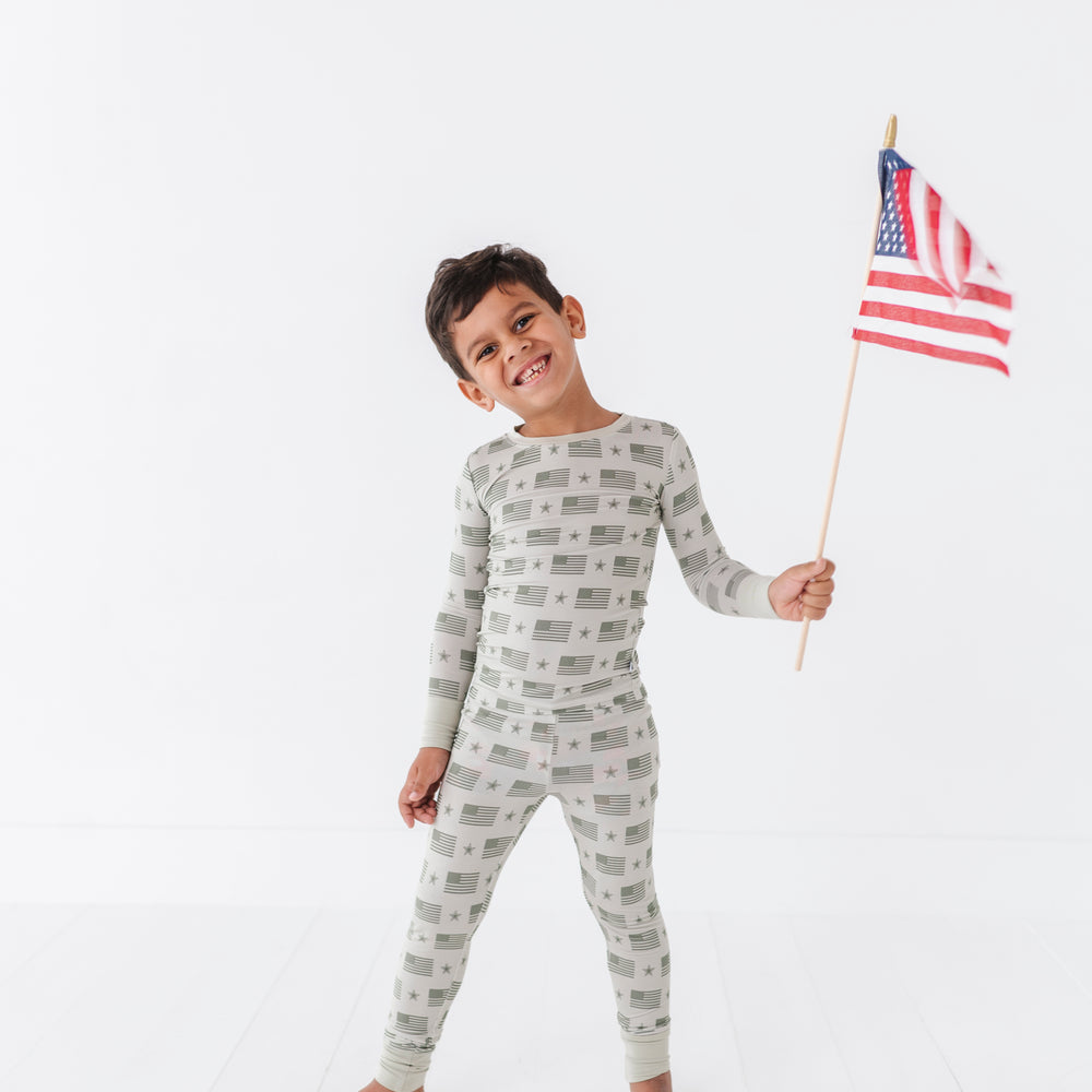 
                      
                        Boy in Military Flag Pajamas
                      
                    