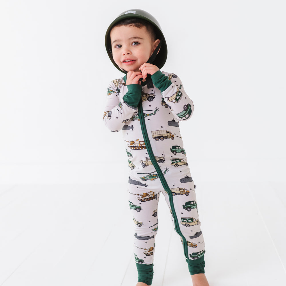 
                      
                        Boy wearing Military Vehicle Zip Pajamas
                      
                    