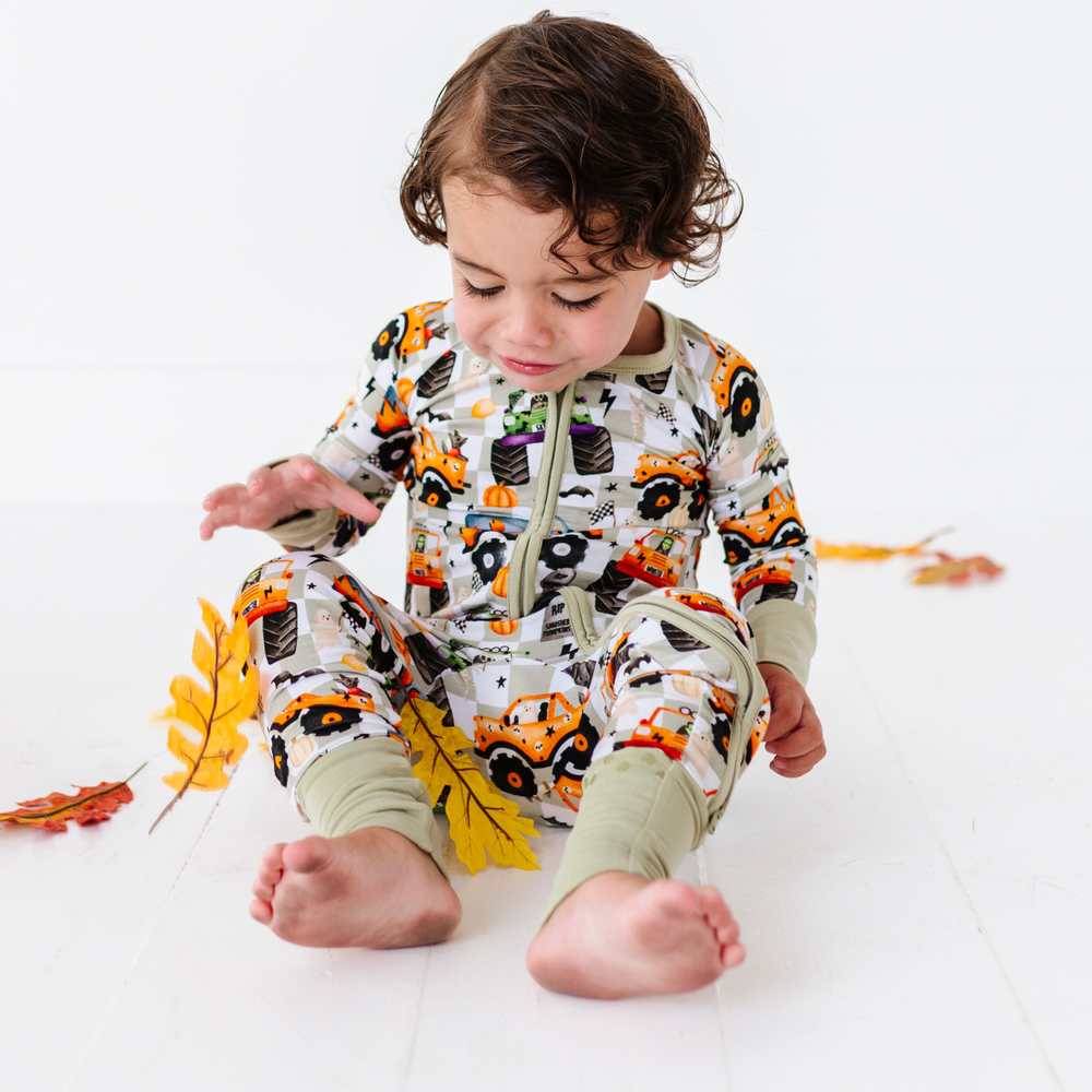 
                      
                        Boy in Halloween Monster Truck Pajamas by Kiki and Lulu
                      
                    