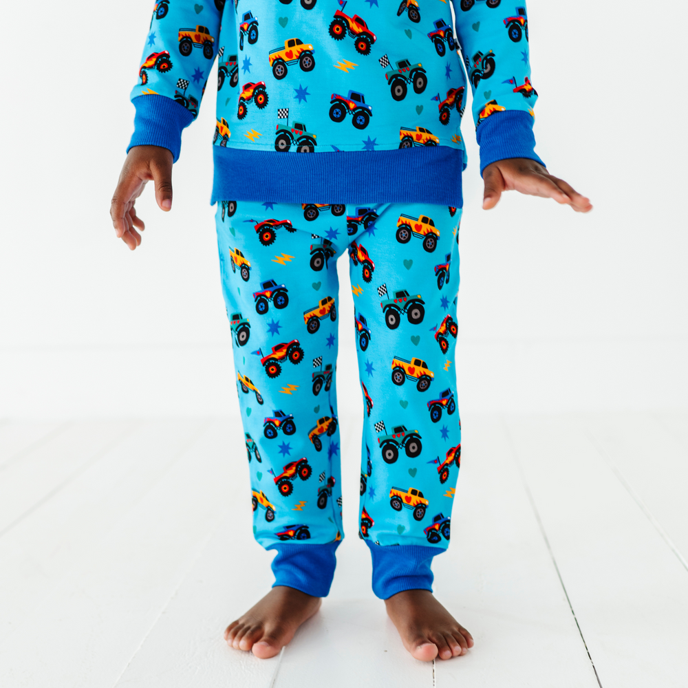 
                      
                        Kid wearing monster truck jogger set by Kiki and Lulu
                      
                    