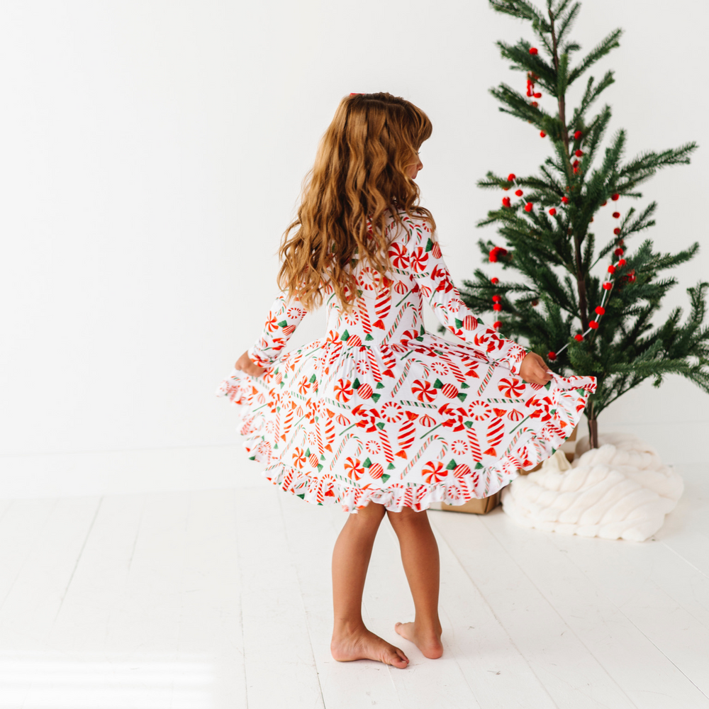 
                      
                        Girl in peppermint Christmas Dress
                      
                    