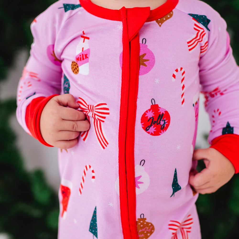 
                      
                        Baby in Pink Christmas pajamas by Kiki and Lulu
                      
                    