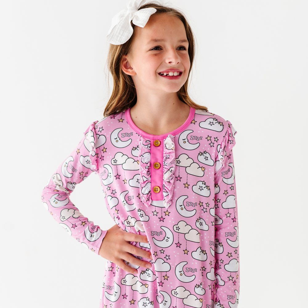 
                      
                        Girl in pink moon nightgown by Kiki and Lulu
                      
                    