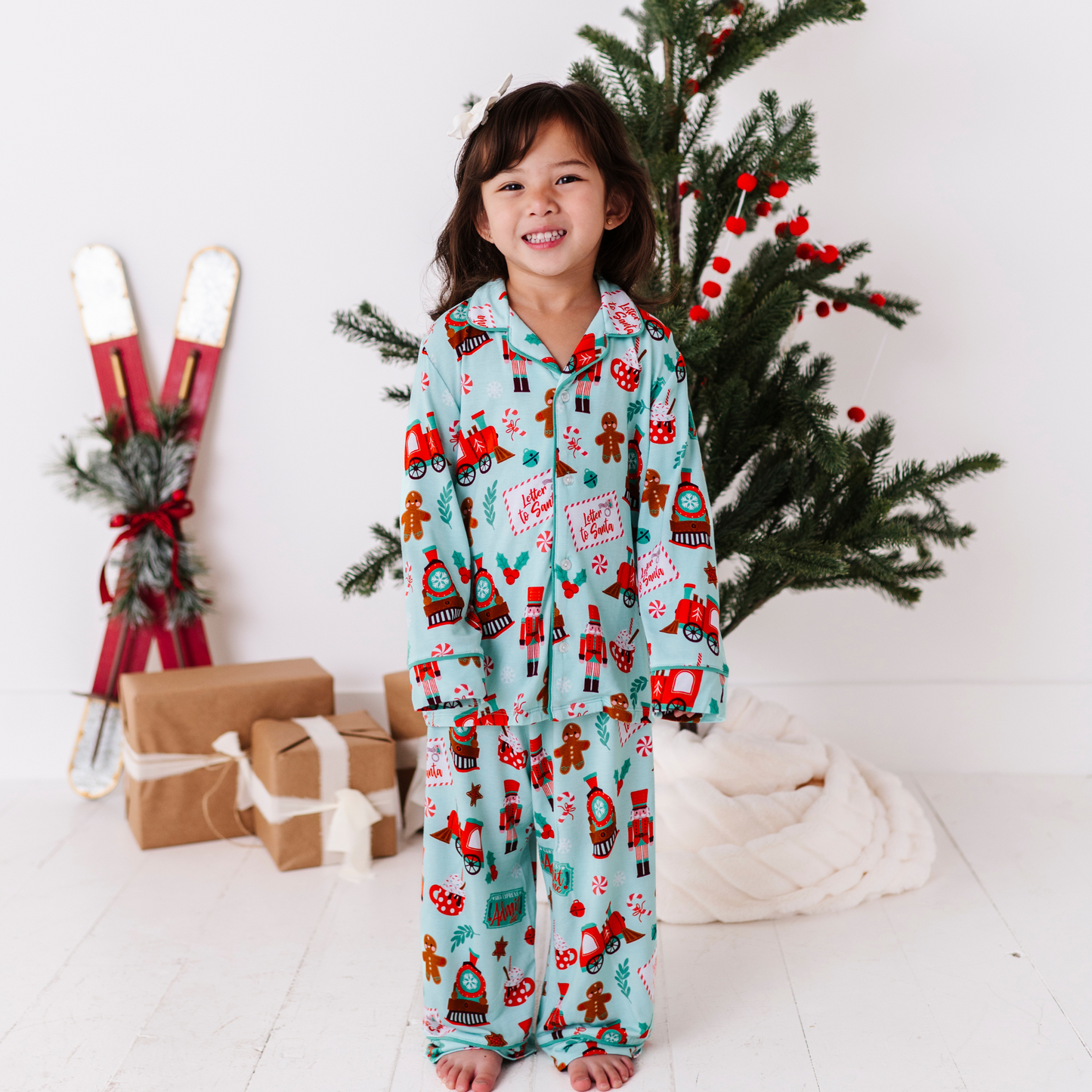 Girl in Christmas Train Pajamas