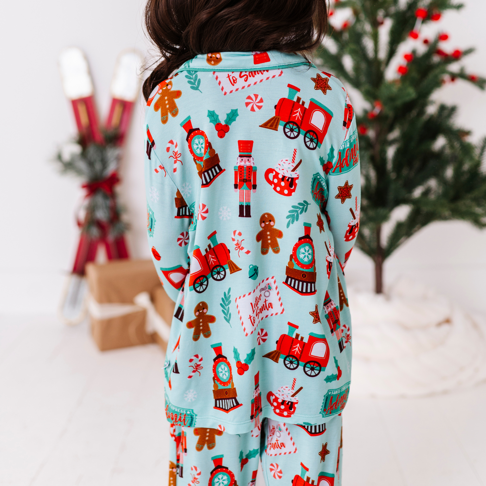 
                      
                        Girl in Christmas Train Pajamas
                      
                    