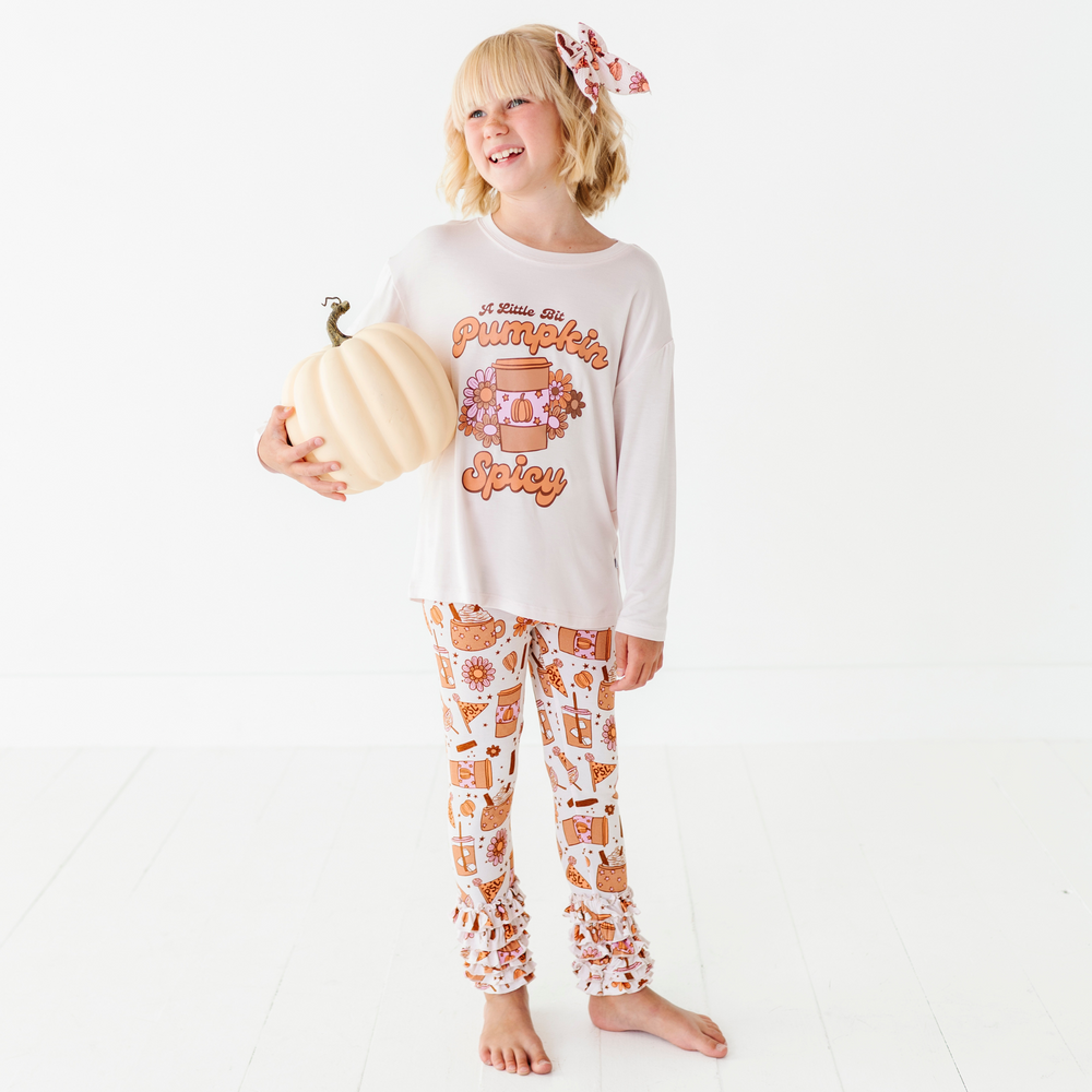 Girl in pumpkin spice latte set