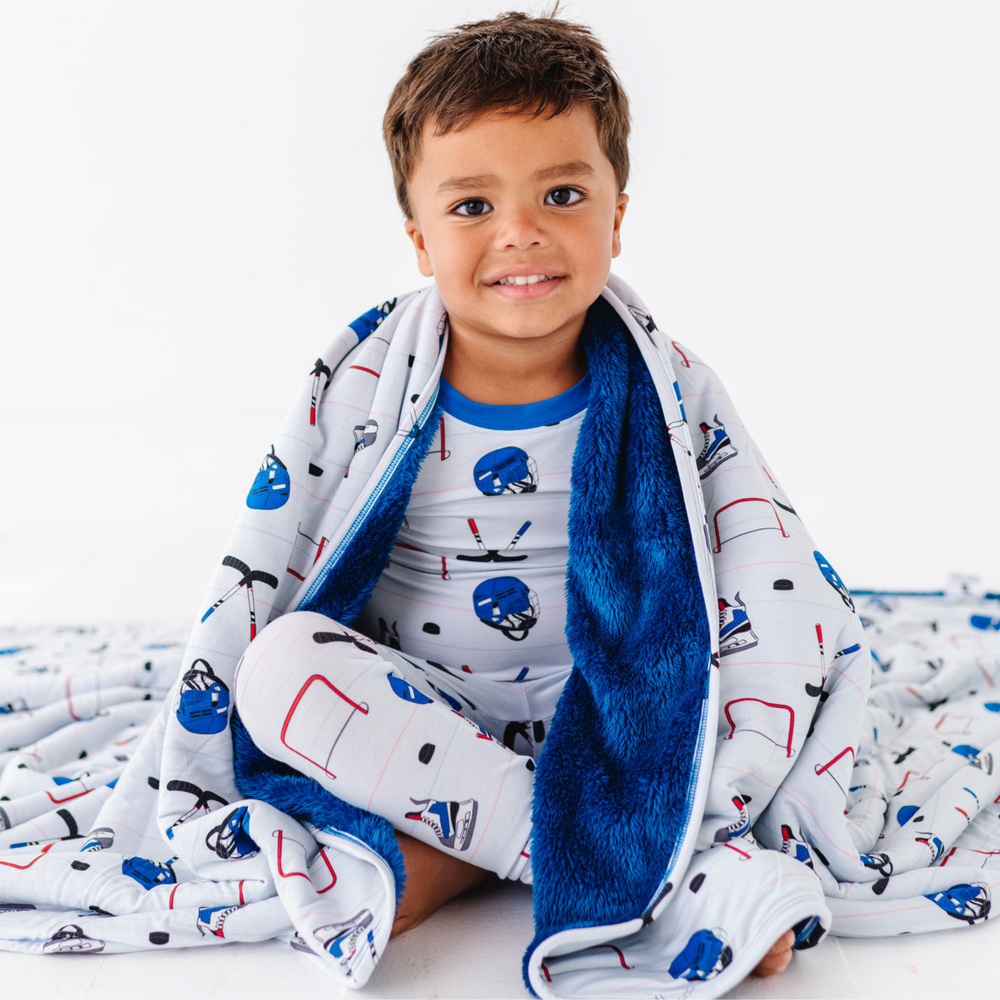 
                      
                        Rink Rat Plush Blanket
                      
                    