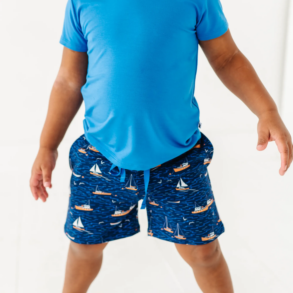 
                      
                        Boy in Sailboat shorts by Kiki and Lulu
                      
                    