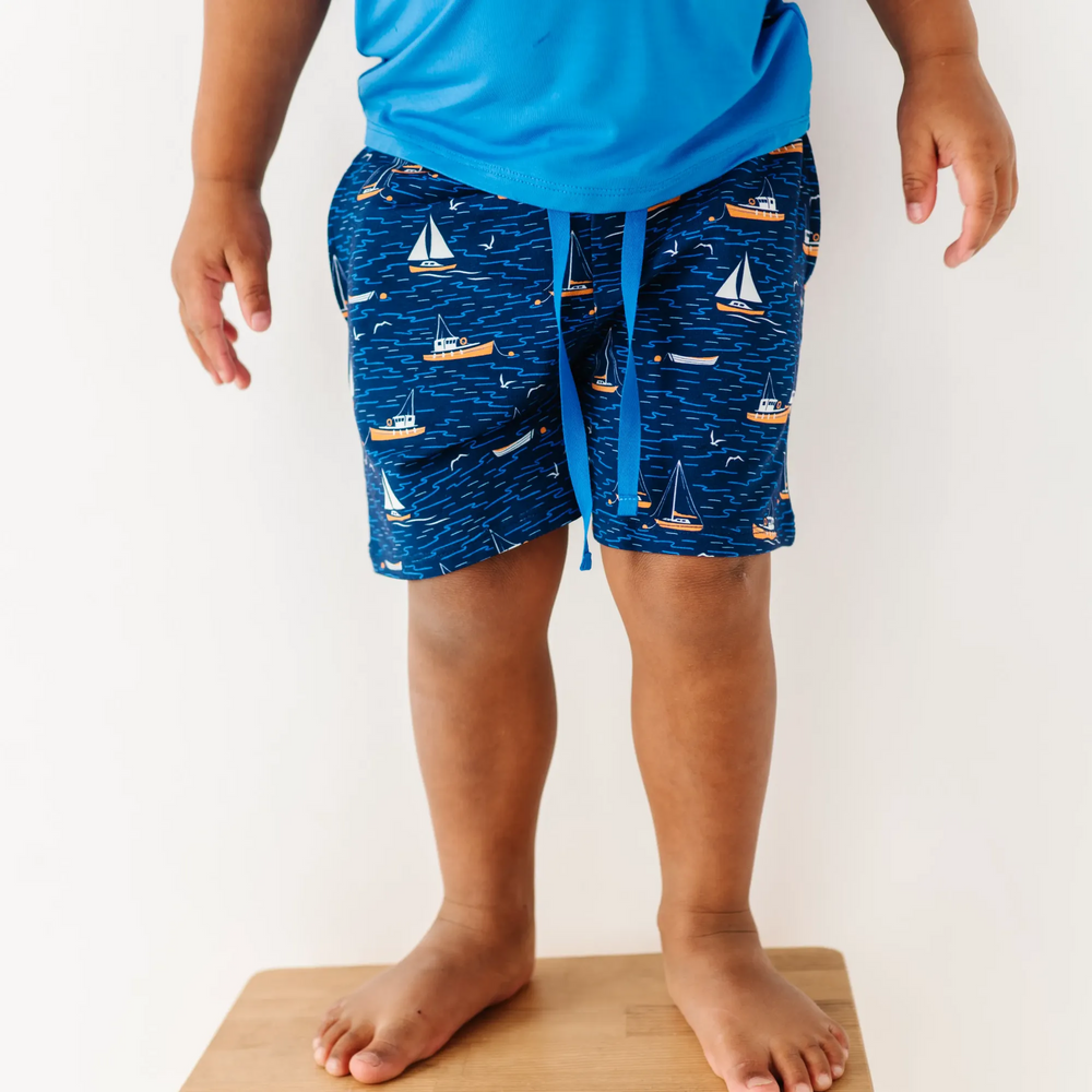 
                      
                        Boy in Sailboat shorts by Kiki and Lulu
                      
                    