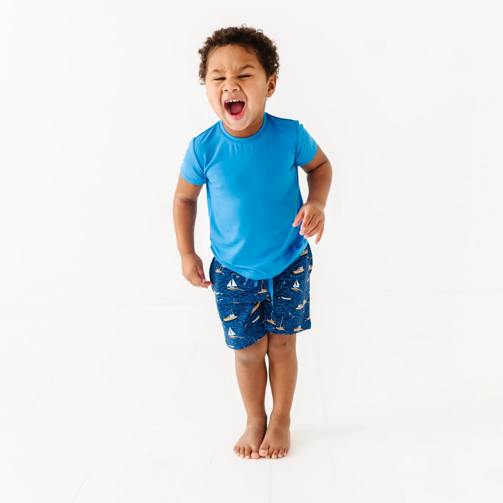 
                      
                        Boy in Sailboat shorts by Kiki and Lulu
                      
                    