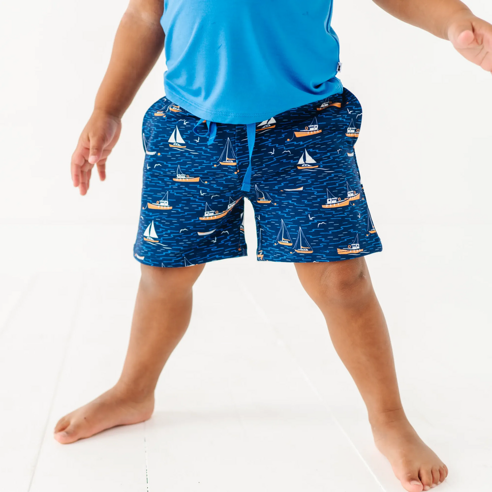 
                      
                        Boy in Sailboat shorts by Kiki and Lulu
                      
                    