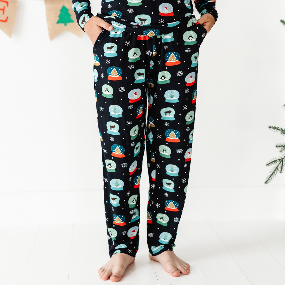 
                      
                        Boy in Kiki and Lulu Christmas Family Matching Snow Globe Pajamas
                      
                    