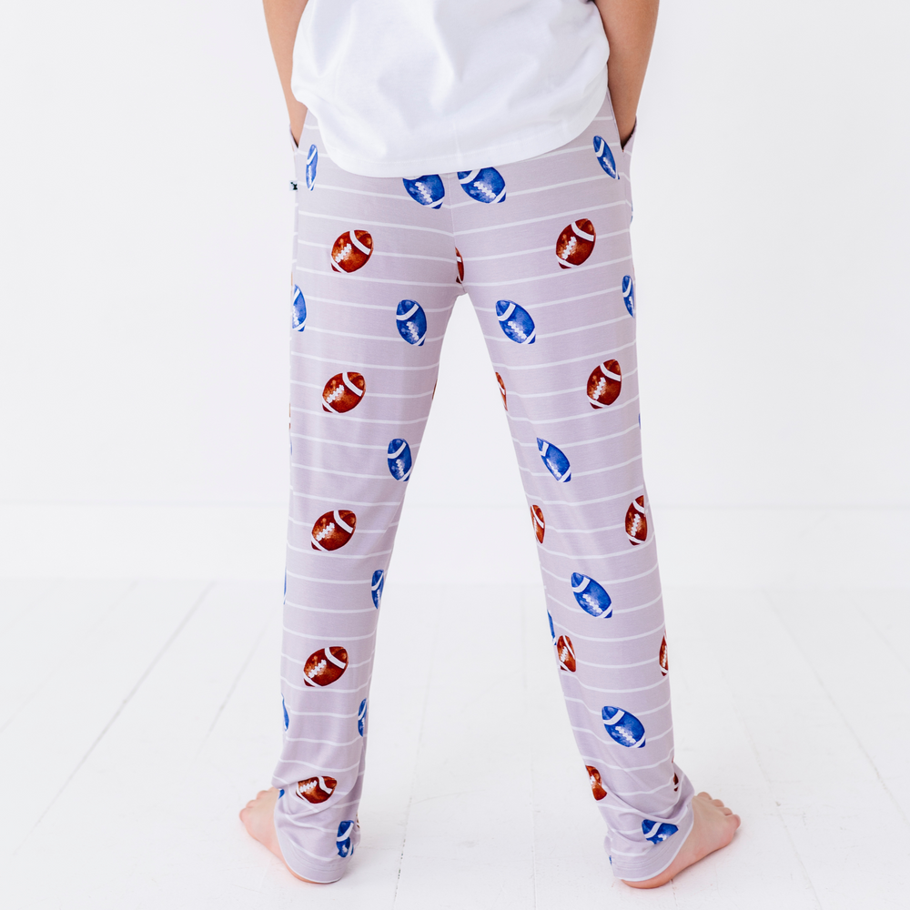 
                      
                        Teen in Football Lounge PantsTeen in Football Lounge Pants
                      
                    